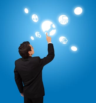 business man pressing settings button 
