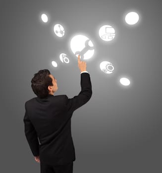 business man pressing settings button 