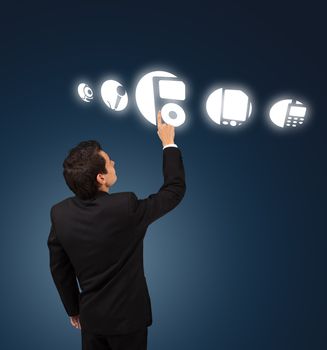 business man pressing MP4 Player button 