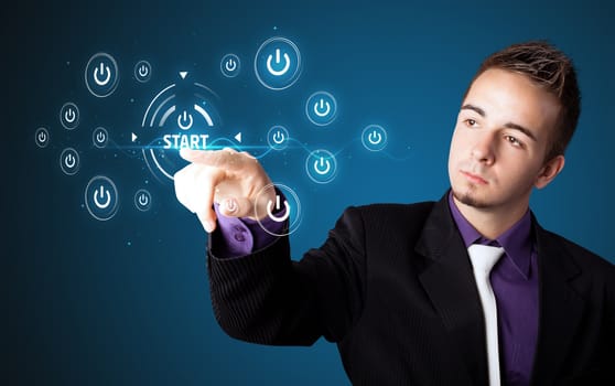 Businessman pressing simple start buttons on a virtual background