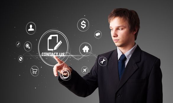 Businessman pressing messaging type of modern icons with virtual background