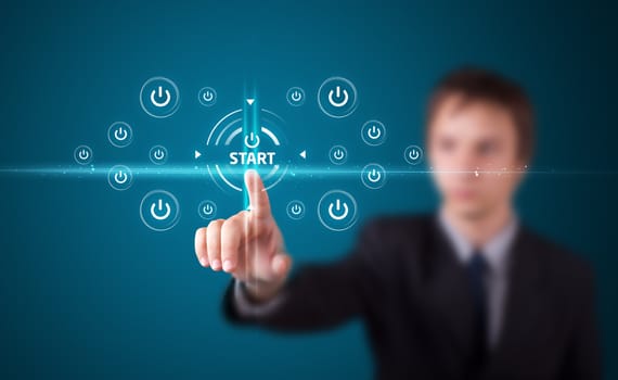 Businessman pressing simple start buttons on a virtual background