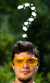 Young persons head looking with gesture at writing marks