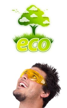 Young persons head looking at green eco sign