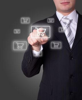 Man hand pressing shopping cart icon