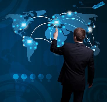 Businessman hand pressing digital button on futuristic map