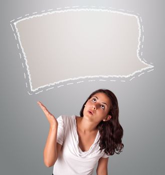 Attractive young woman looking abstract speech bubble copy space