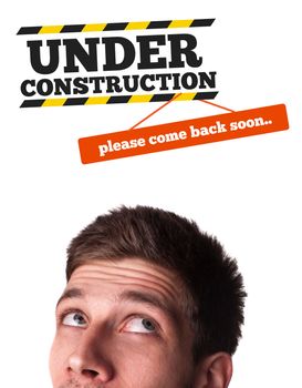 Young persons head looking at construction signs