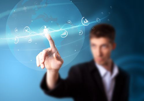 Businessman pressing modern social buttons on a virtual background
