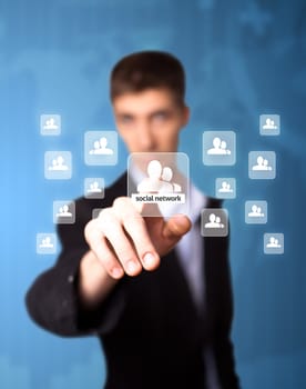 Man pressing social network icon, futuristic technology