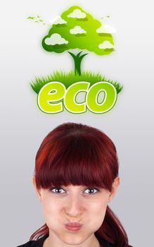 Young girl head looking at green eco sign