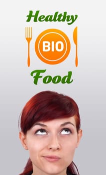 Young girl head looking with gesture at healthy food sign