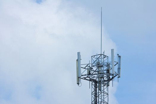 Communication tower over a blue sky background