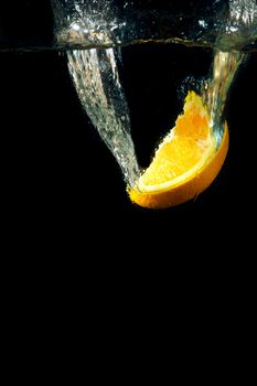 Bright and juicy lemon under water. Fresh and healthy meal