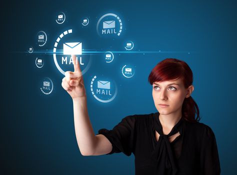 Businesswoman pressing messaging type of modern icons with virtual background