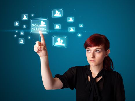 Businesswoman pressing modern social buttons on a virtual background