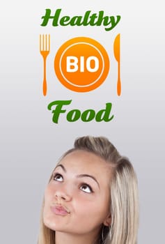 Young girl head looking with gesture at healthy food sign
