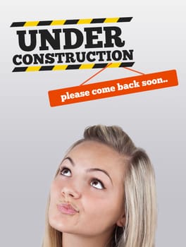 Young girl head looking at construction signs