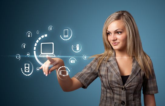 Businesswoman pressing multimedia type of modern buttons with virtual background