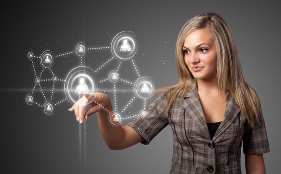 Businesswoman pressing modern social buttons on a virtual background