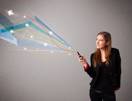 pretty young lady standing and holding a phone with colorful abstract lines and arrows