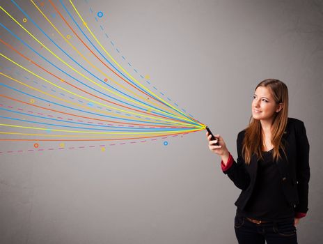 Happy young girl holding a phone with colorful abstract lines