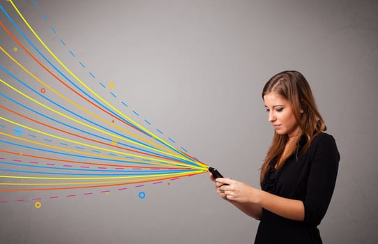 Happy young girl holding a phone with colorful abstract lines