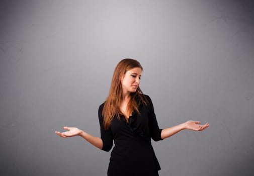 beautiful young lady standing and juggling with copy space