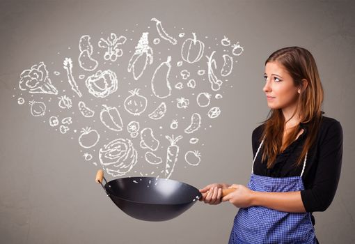 Pretty lady cooking vegetables