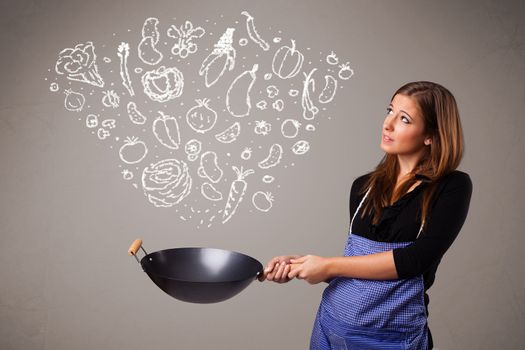 Pretty lady cooking vegetables