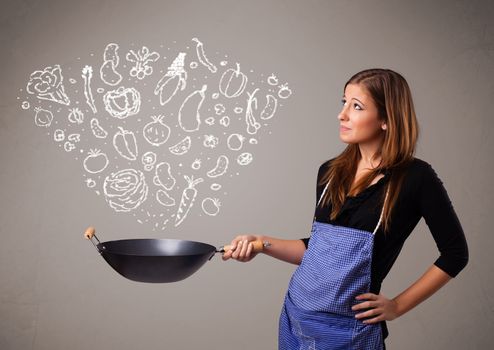 Pretty lady cooking vegetables
