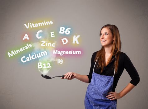 Pretty young woman cooking vitamins and minerals