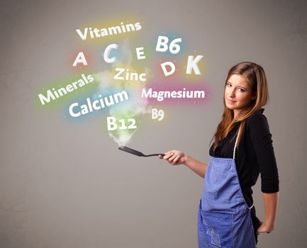 Pretty young woman cooking vitamins and minerals