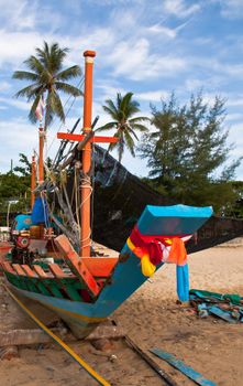 Fishing boats that are waiting to be repaired.