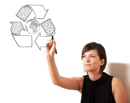Young woman drawing recycle globe on whiteboard isolated on white