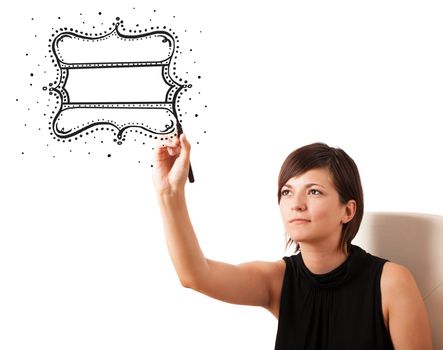 Young woman drawing a quality vintage label isolated on white