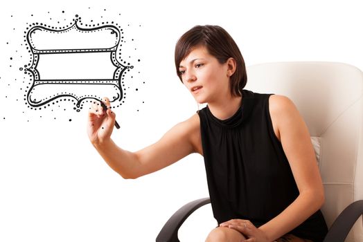 Young woman drawing a quality vintage label isolated on white