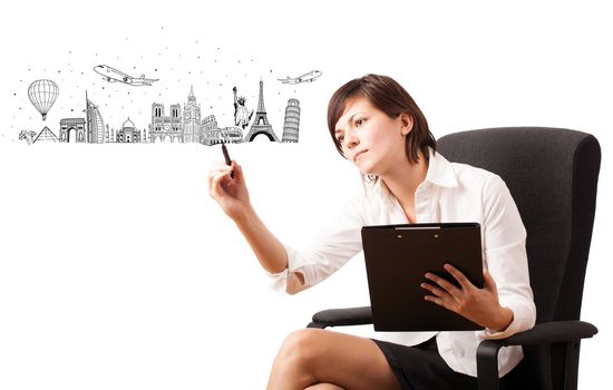 Young woman drawing famous cities and landmarks on whiteboard isolated on white