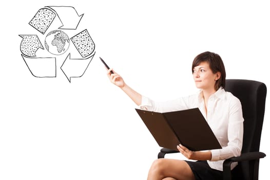 Young woman presenting recycle globe on whiteboard isolated on white