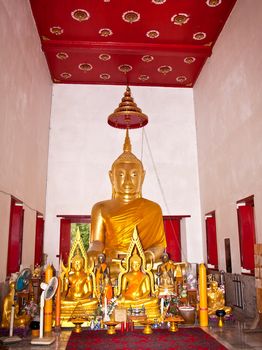 Buddha statue in the hallway  in the thai temple.