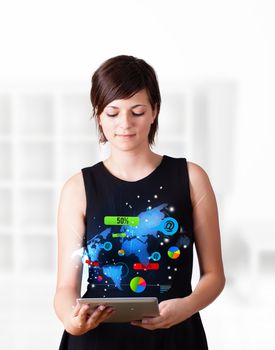 Young business woman looking at modern tablet with colourful technology icons