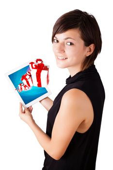 Young business woman looking at modern tablet with present boxes