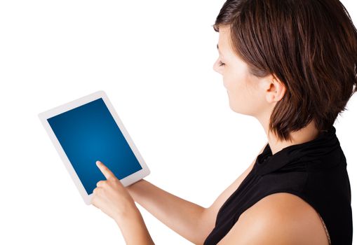 Young business woman looking at modern tablet