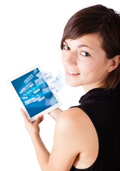 Young business woman looking at modern tablet with social icons