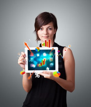 beutiful woman holding modern tablet with colorful diagrams and graphs