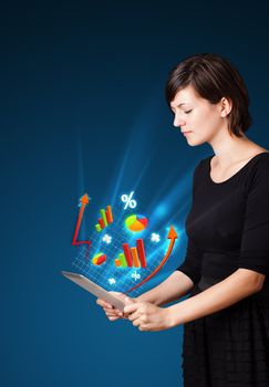 Young business woman looking at modern tablet with abstract lights and various diagrams