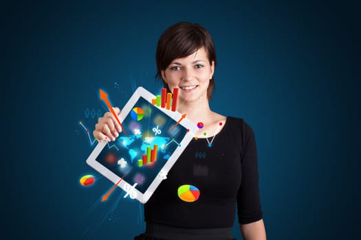 beutiful woman holding modern tablet with colorful diagrams and graphs