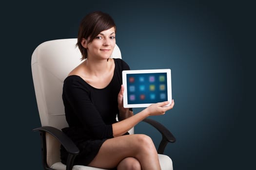 beautiful woman holding modern tablet with colorful icons