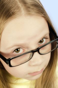 Beautiful little girl looking up