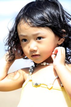 Portrait of the beautiful small Asian girl. Indonesia. Java